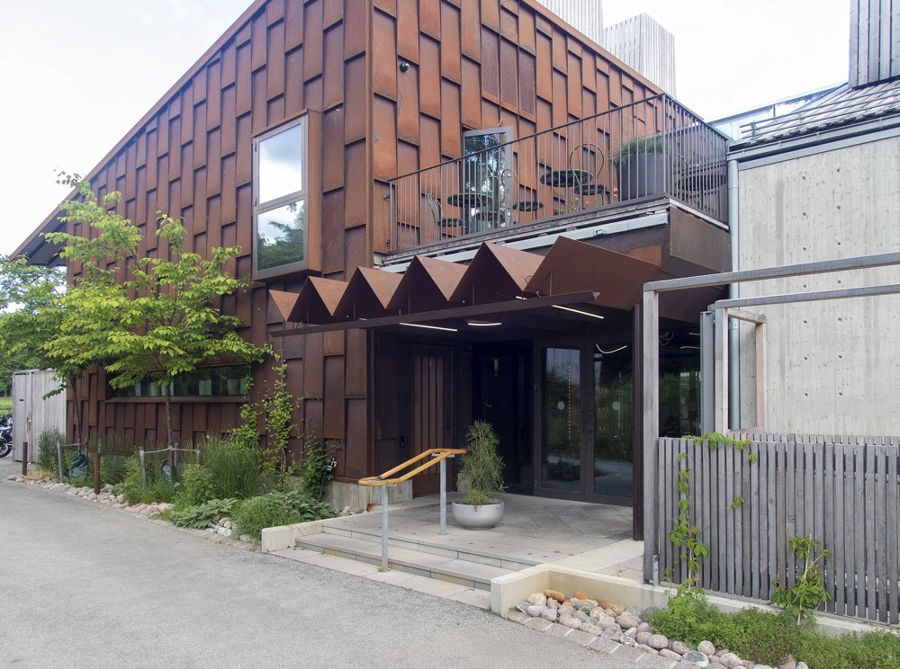 The copper-clad building and entrance steps of Aira on Södra Djurgården, Stockholm