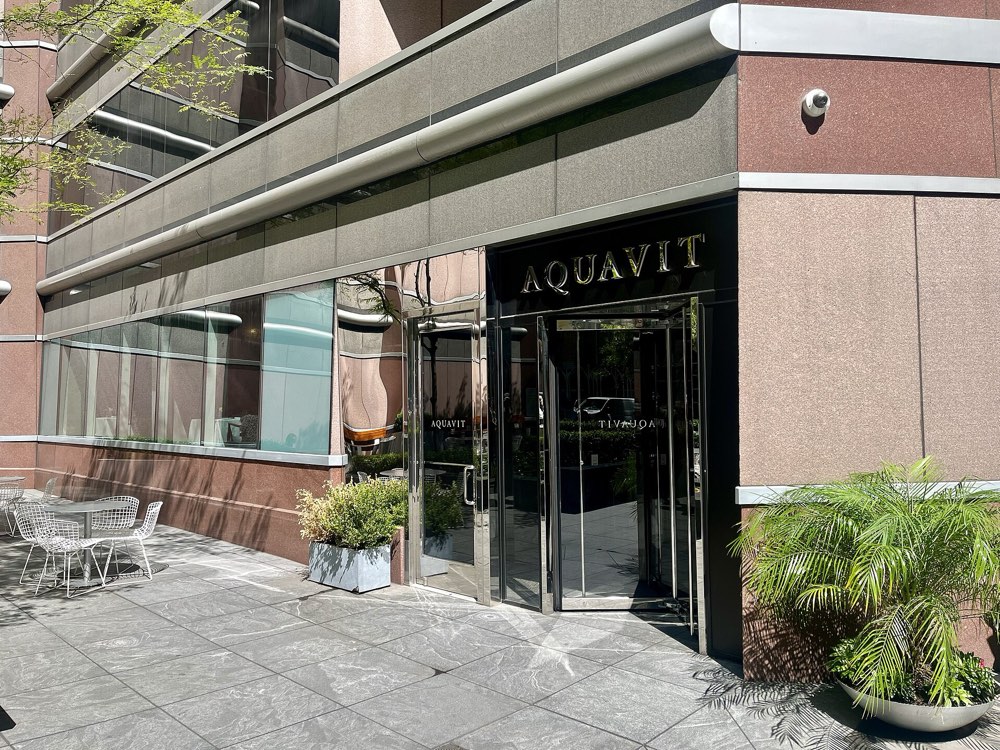 The entrance of Aquavit under its name at 65 East 55th Street, New York