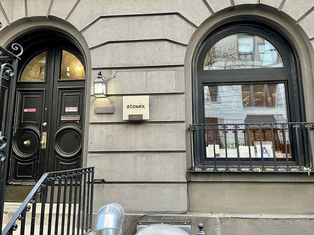The arched doors and Atomix sign at 104 East 30th Street, New York
