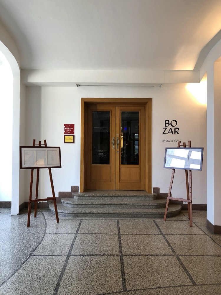 The entrance doors of Bozar Restaurant with its sign, inside the Centre for Fine Arts, Brussels