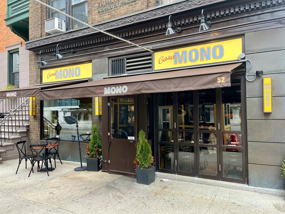 The yellow Casa Mono signs over its storefront at 52 Irving Place, New York