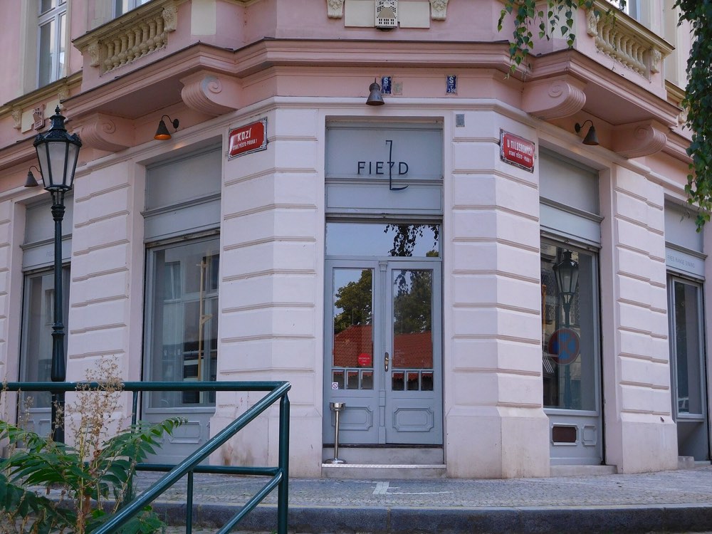 The entrance of Field on Kozí street, Prague, with its sign