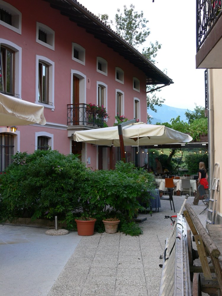 The pink house and terrace of Hiša Franko in Kobarid