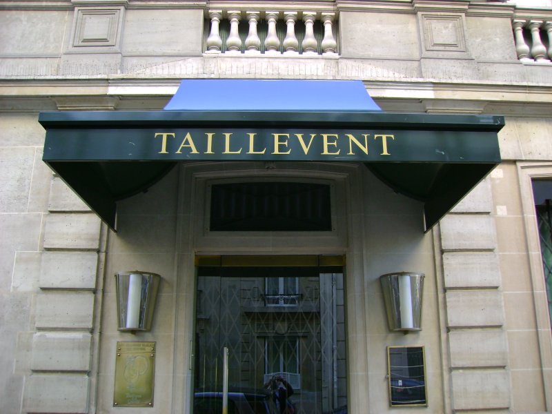 The entrance of Taillevent with its name on the awning, Paris