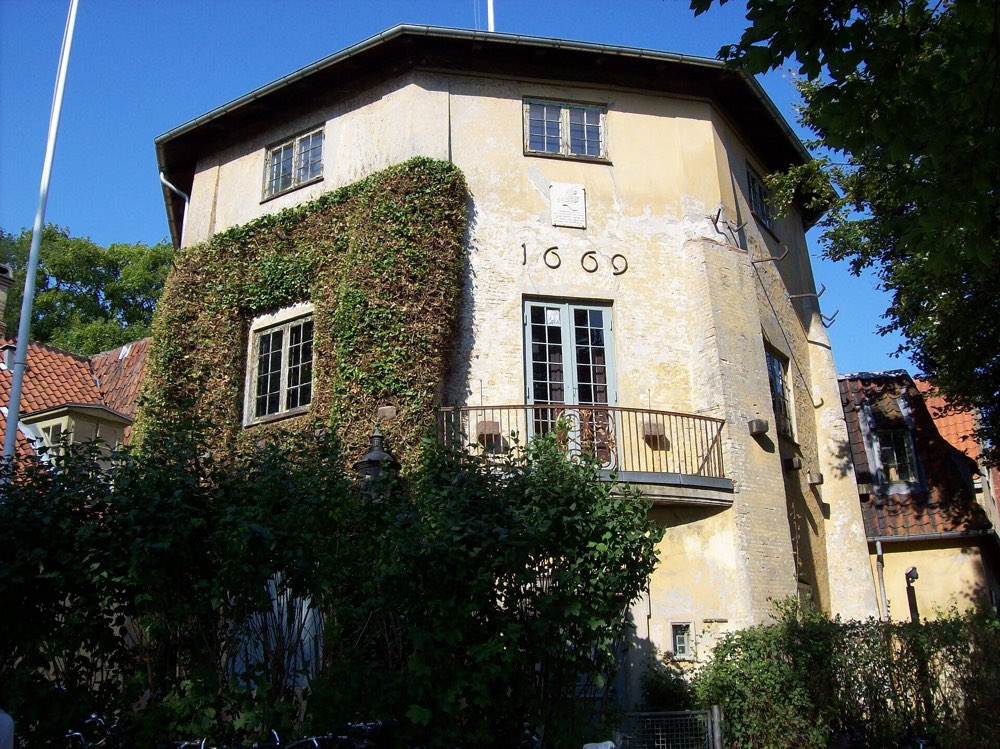 The ivy-covered Lille Mølle house dated 1669 in Christianshavn, Copenhagen