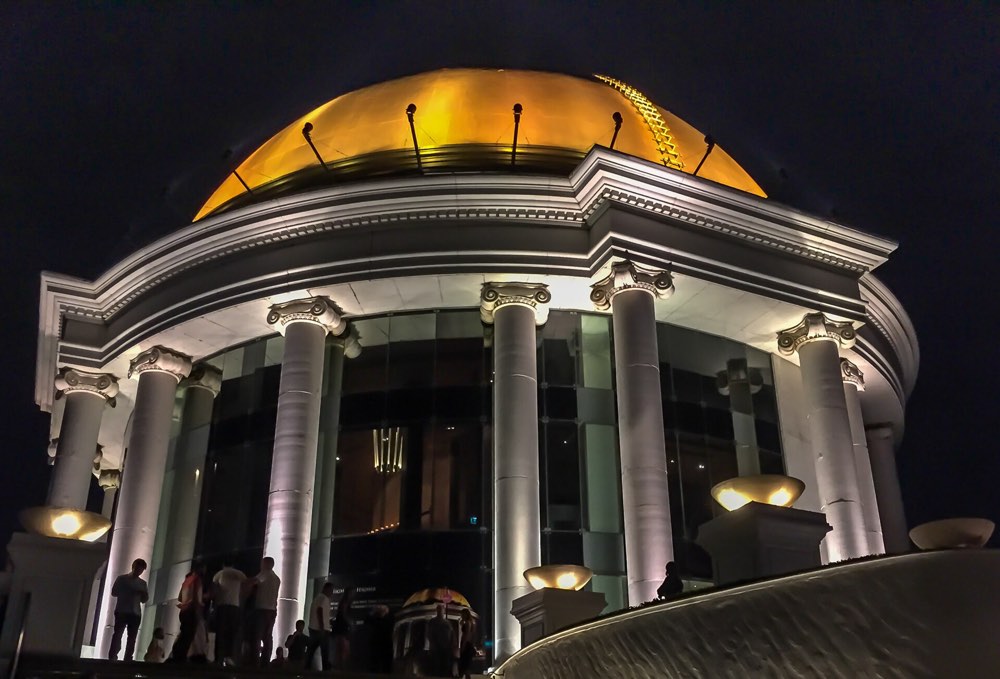 The illuminated golden dome of lebua's State Tower in Bangkok, where Mezzaluna is